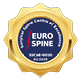 Ein golden blaues Siegel mit Text: Surgical Spine Centre of Excellence